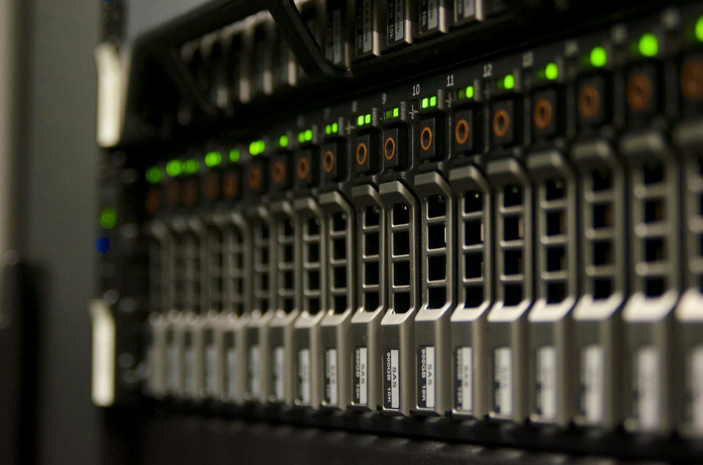Close-up of backend server hardware with status indicator lights
